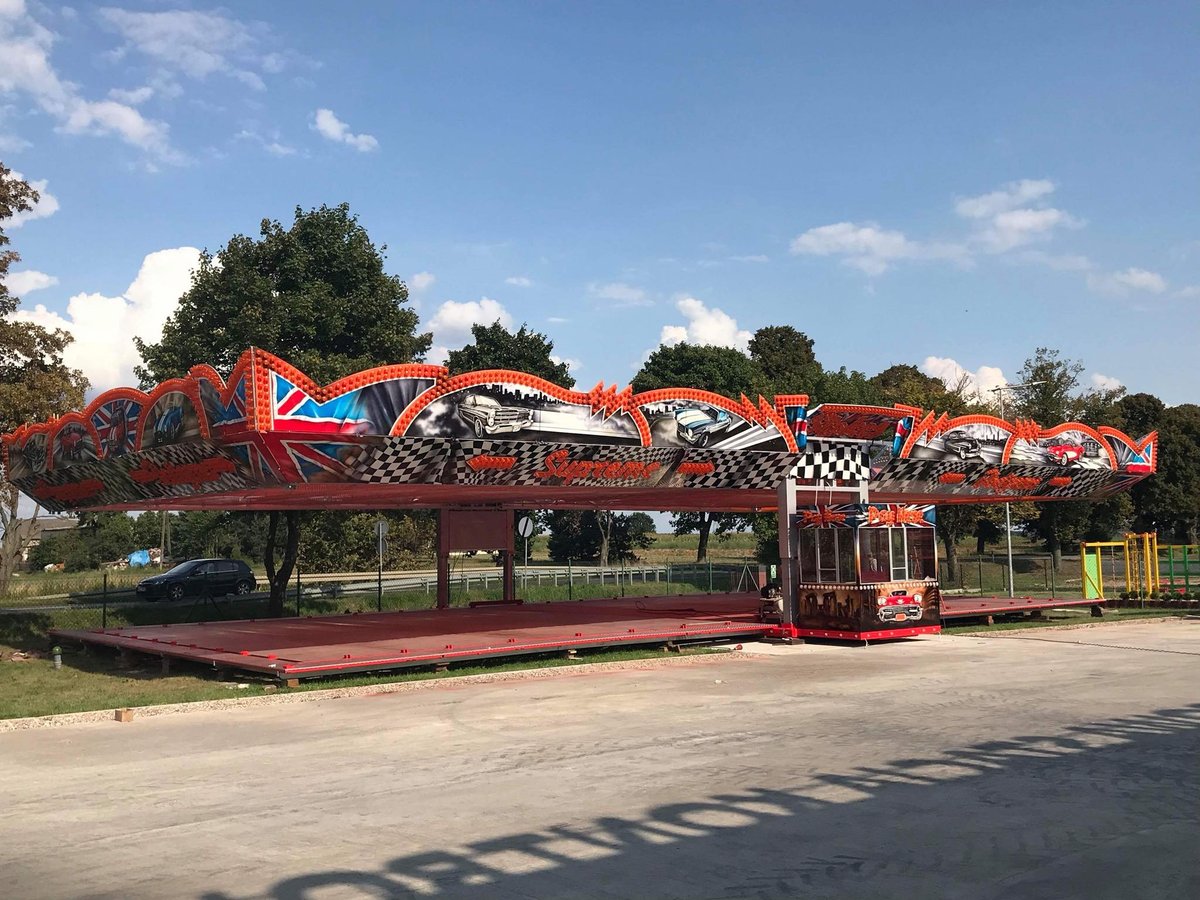 Custom-themed dodgem track facade — airbrushed artwork